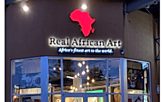 Channel Letter Sign with Logo and Tagline Lightbox [JC Signs for Real African Art of Charlotte]